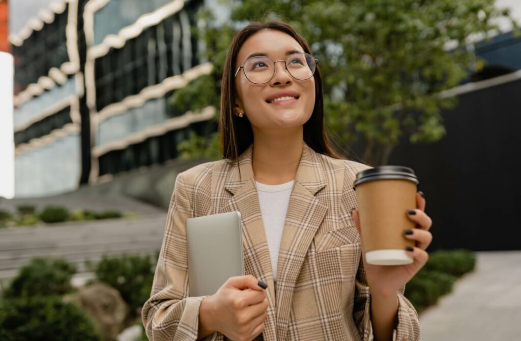 A professional wearing comfortable and stylish eyewear on their way to work.